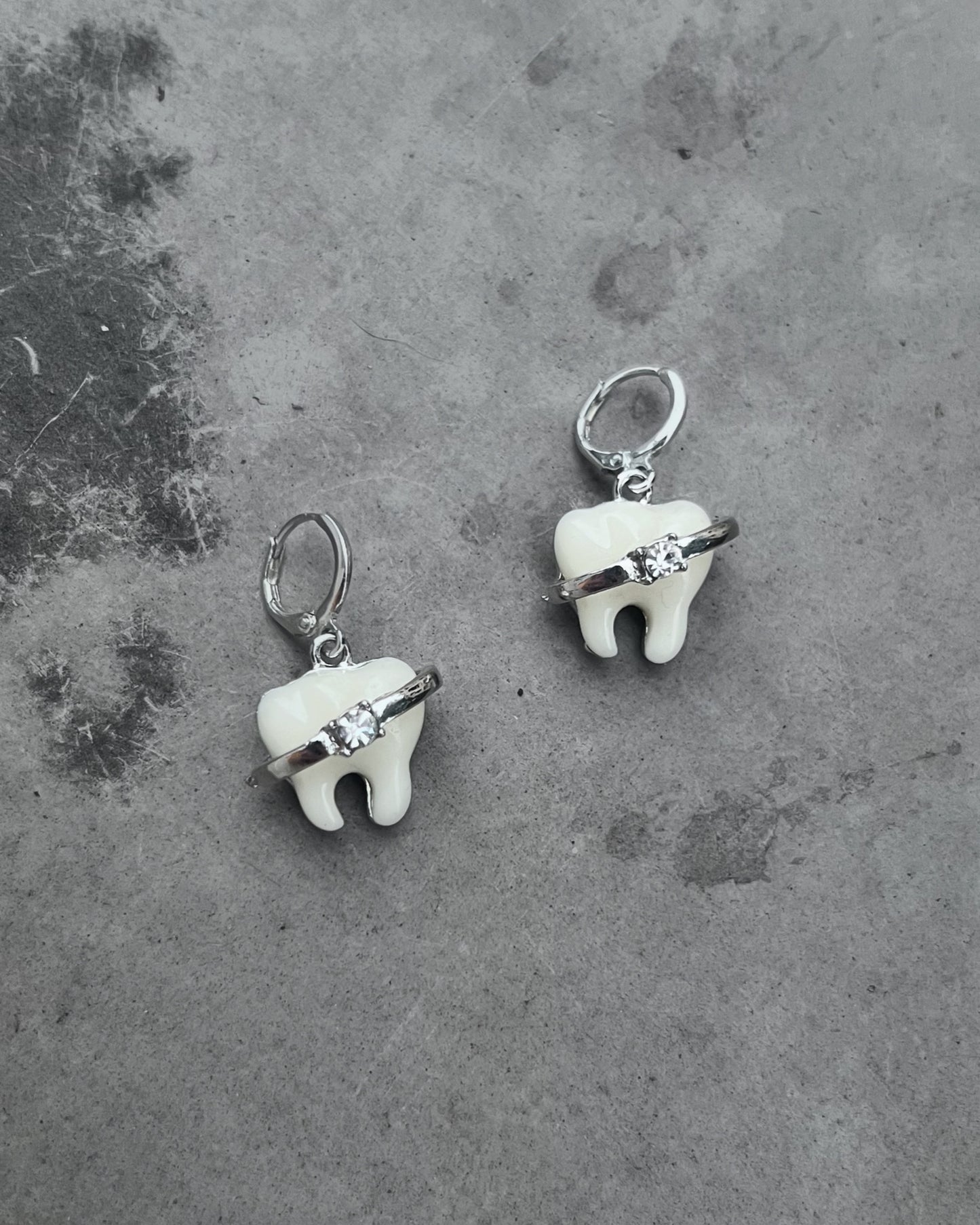 brace up for gemstones tooth earrings