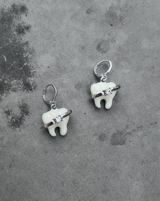 brace up for gemstones tooth earrings