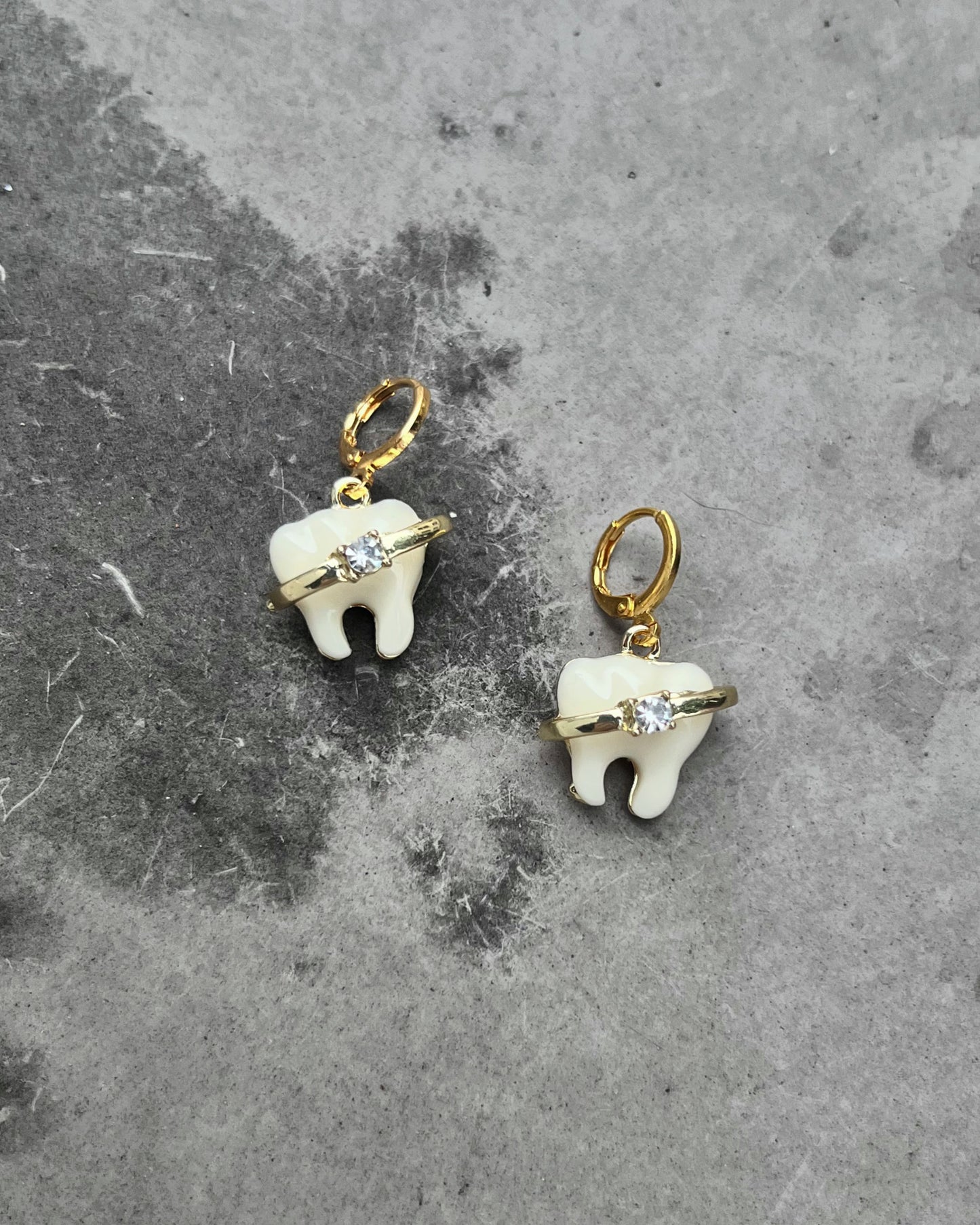 brace up for gemstones tooth earrings